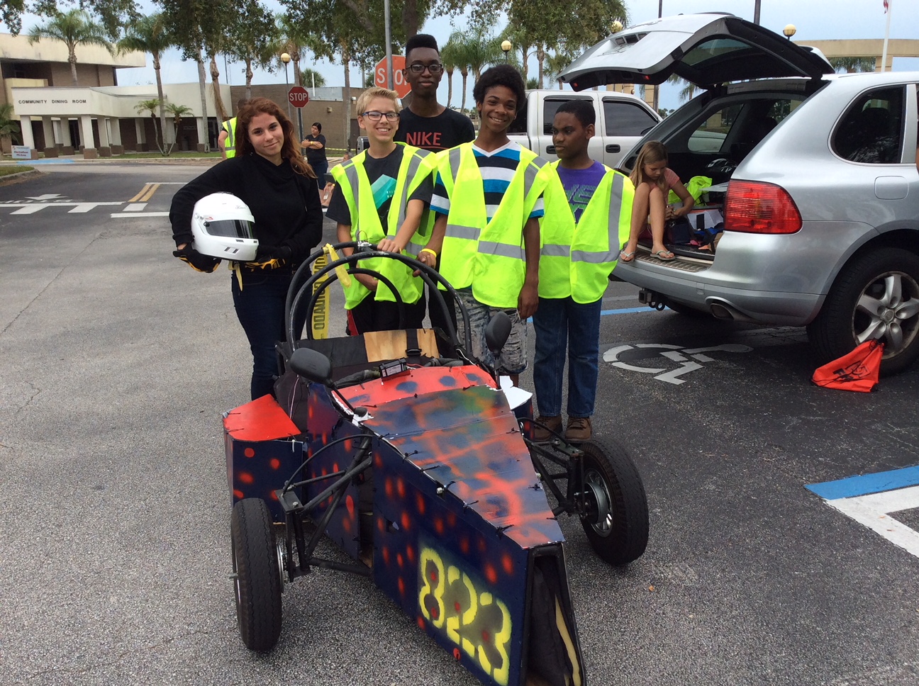 men with race car