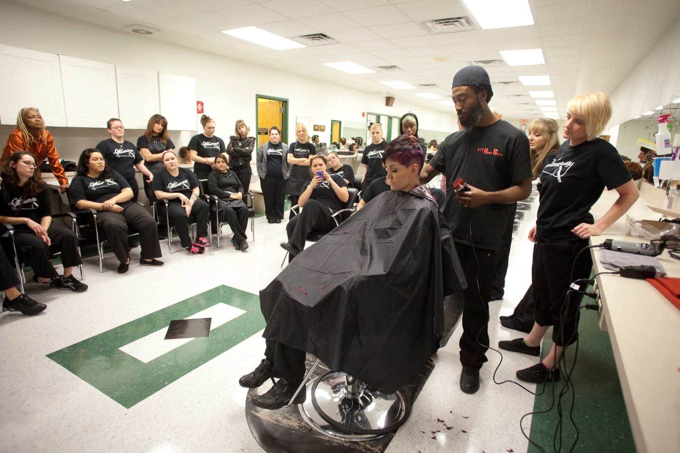 Cosmetology students watching a demonstration in the EFSC public salon that doubles as a classroom