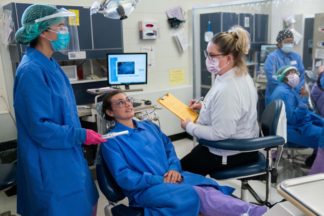 Real-world dental hygiene training with students actively engaged in a clinical setting on campus.