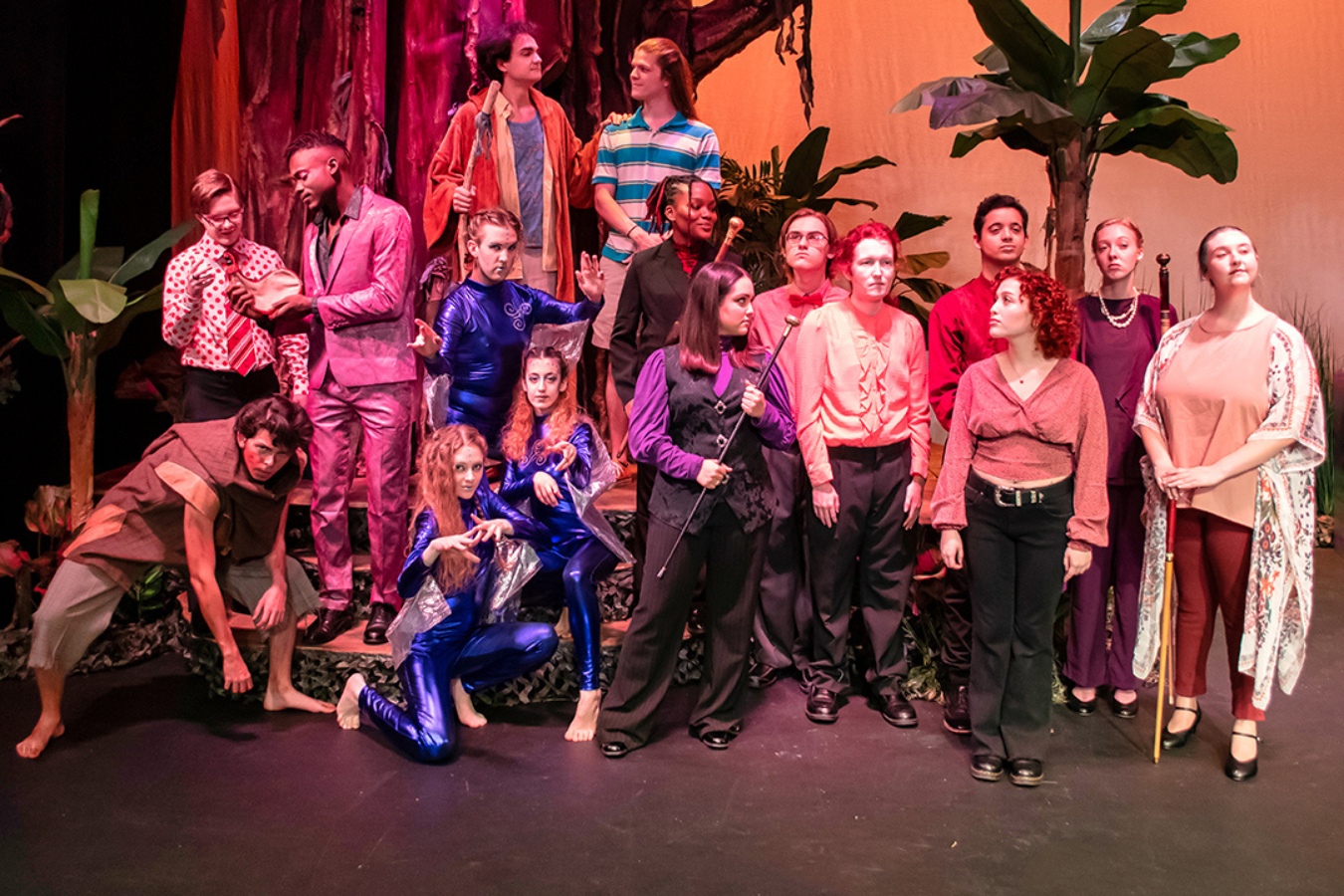 Vibrant group photo of performing arts students in costume for the play "The Tempest" during a dress rehearsal.