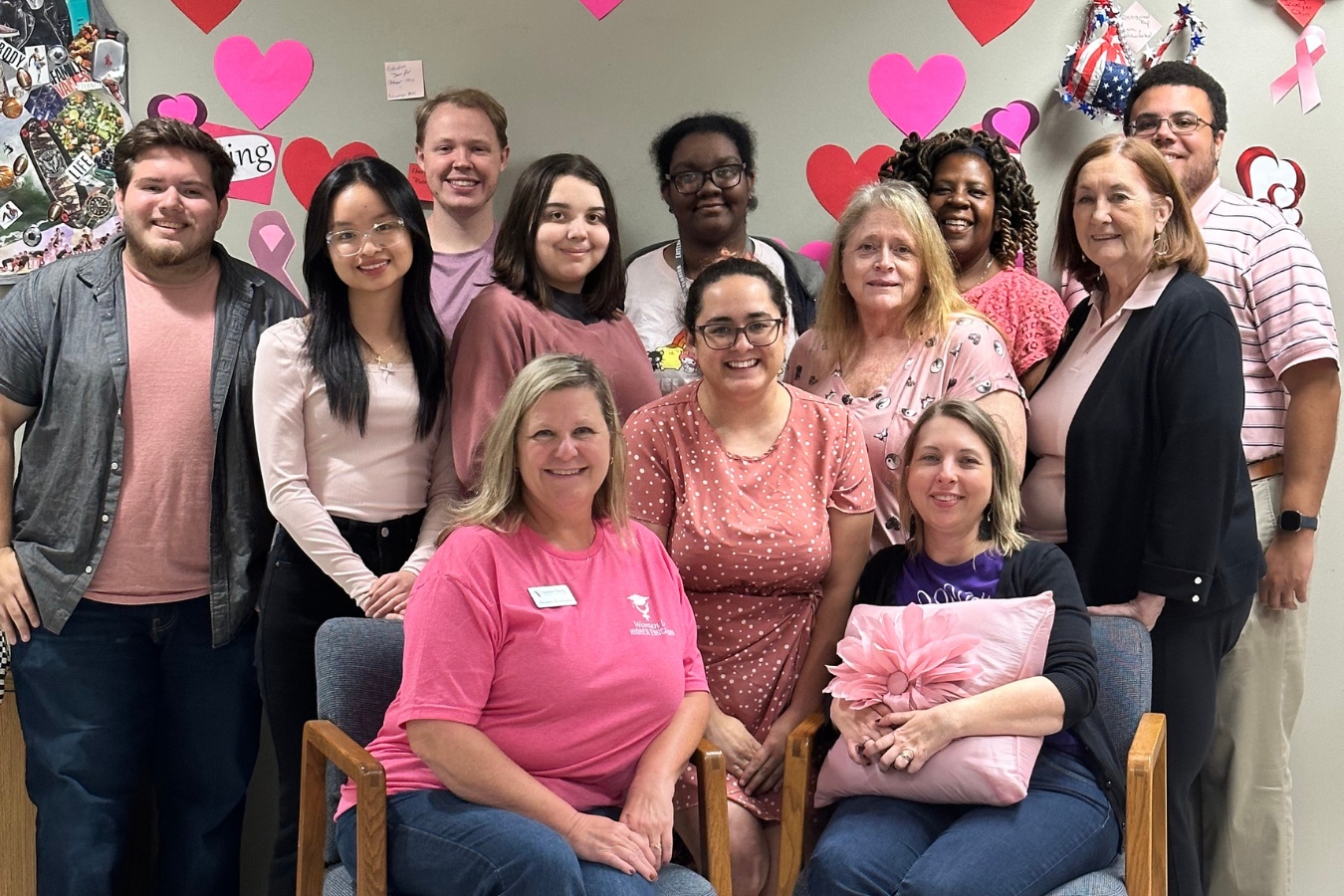 Titusville Campus Student Services posed for a photo wearing pink to support Breast Cancer Awareness