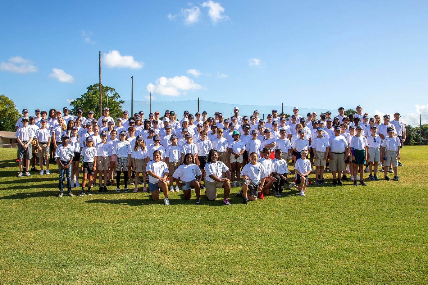 Vibrant group photo of the 2024 Youth Golf Camp participants