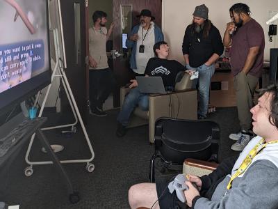 A group of students are playing video games together