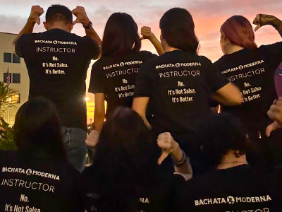 Club officers wearing t-shirts with the phrase, "No. It's not Salsa. It's Better"