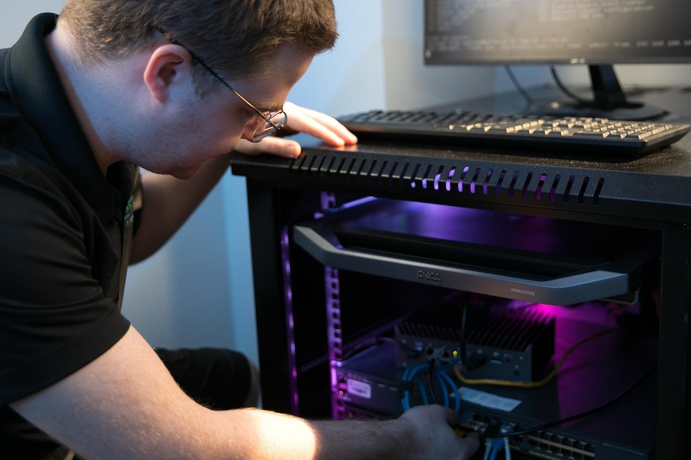 IT student working with a computer