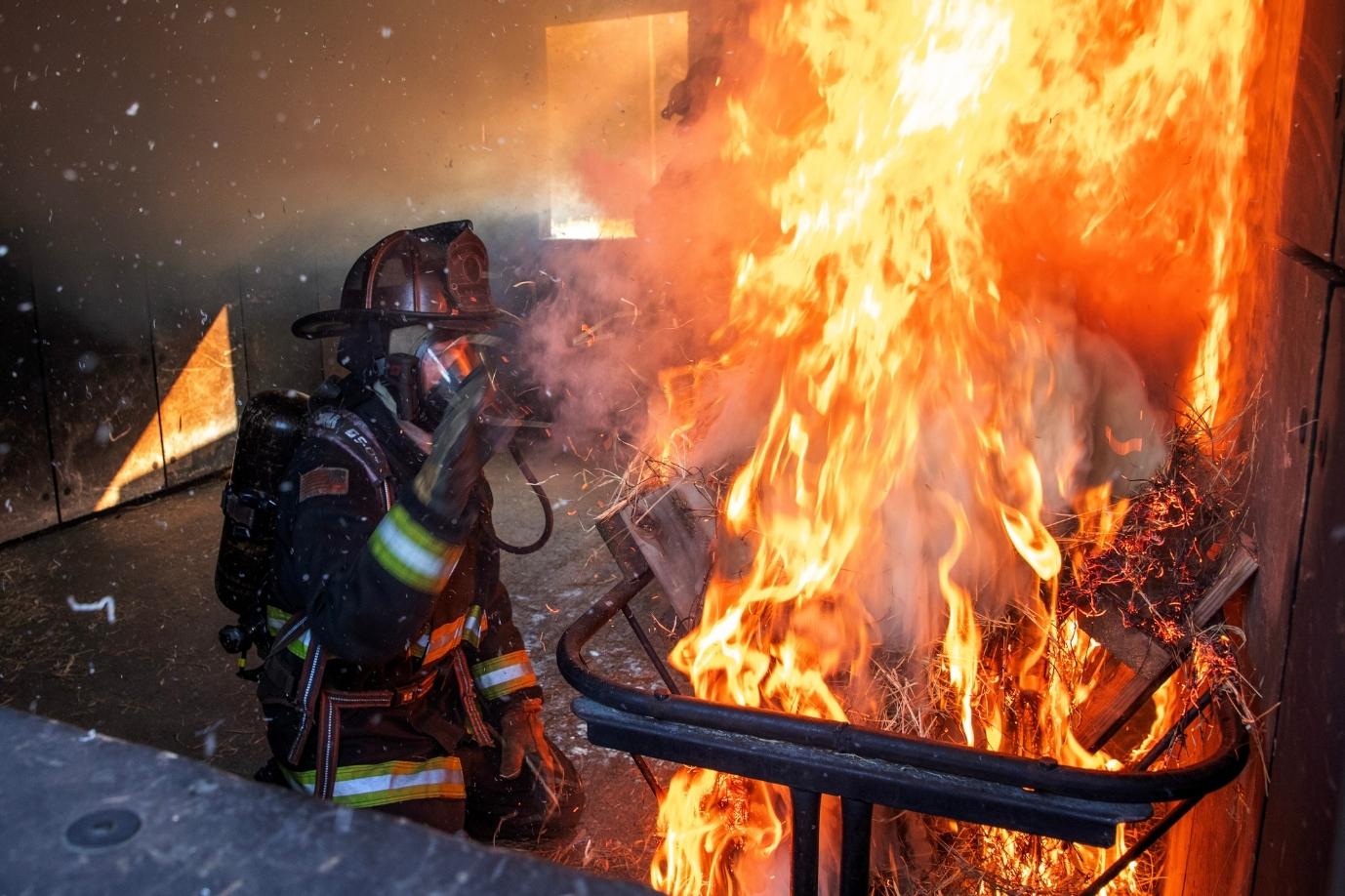 firefighter student in a live simulation