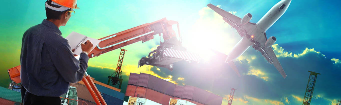 Man overseeing a cargo loading operation, with an airplane flying in the background.