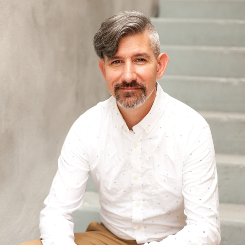 Headshot of Jox Oxford wearing a white button up collaged next to an image of him conducting