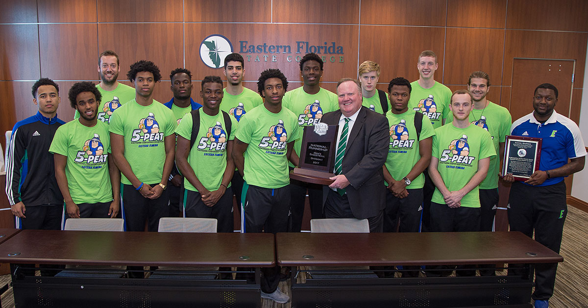 EFSC Men's Basketball present national runner-up trophy