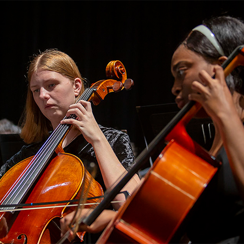 Two female students play on cellos