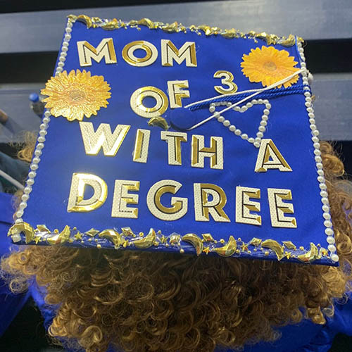 Graduation cap with mother of 3 with a degree message